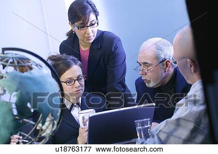 Stock Photo - Team meeting. Fotosearch