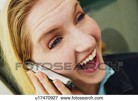 Teen talks on cell phone View Large Photo Image Stock Photo - Teen talks on cell phone. Fotosearch
