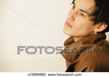 Teenager with collar up View Large Photo Image Stock Photography - Teenager with collar up. Fotosearch
