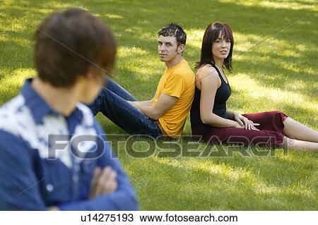 Stock Image - The third wheel. Fotosearch