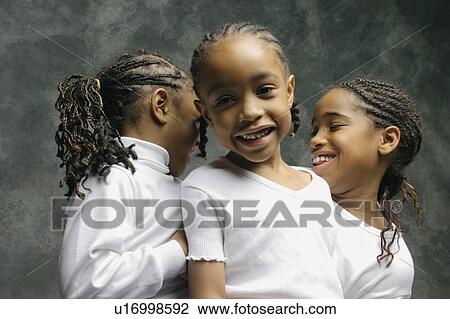 Three children laughing View Large Photo Image Stock Image - Three children laughing. Fotosearch