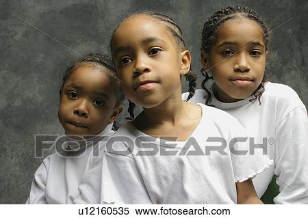 Three young girls View Large Photo Image Stock Photography - Three young girls. Fotosearch