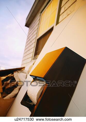 Stock Image - Toilet paper dispenser. Fotosearch