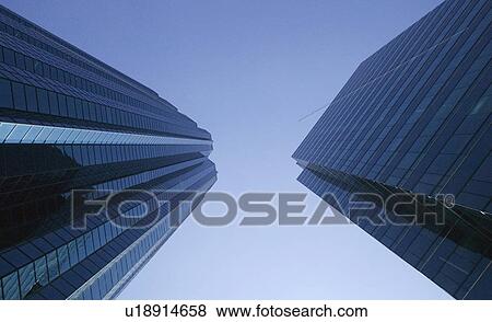 Two tall buildings View Large Photo Image Stock Photo - Two tall buildings. Fotosearch
