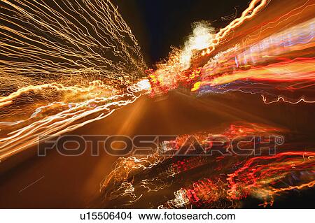 Picture - Vehicle speeding down a road. Fotosearch