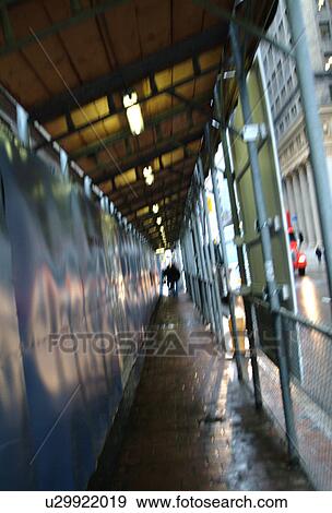 Walkway under scaffolding View Large Photo Image Stock Photo - Walkway under scaffolding. Fotosearch