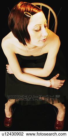 Wearing an evening dress View Large Photo Image Stock Image - Wearing an evening dress. Fotosearch
