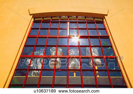 Stock Photo - Window display of dressed tailors' dummies. Fotosearch