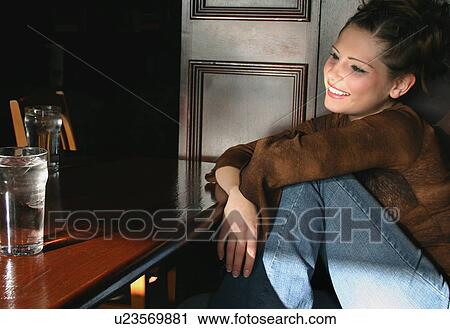 Woman at a restaurant View Large Photo Image Stock Image - Woman at a restaurant. Fotosearch