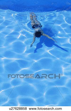 Woman in swimming pool View Large Photo Image Stock Photo - Woman in swimming pool. Fotosearch