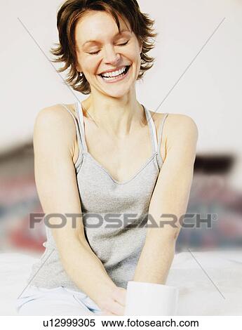 Stock Photography - Woman laughing. Fotosearch