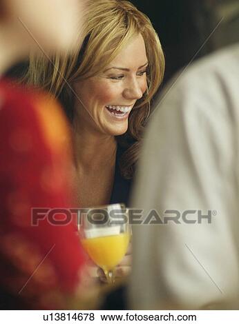 Stock Photo - Woman laughs. Fotosearch