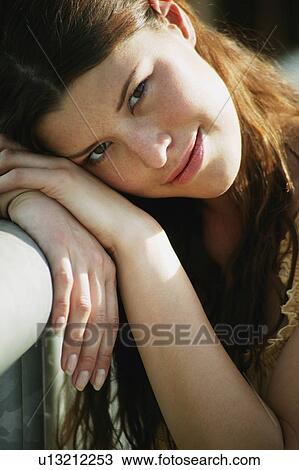 Woman lays head down View Large Photo Image Stock Image - Woman lays head down. Fotosearch