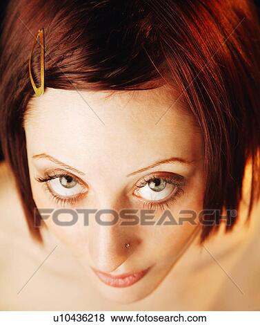 Stock Photo - Woman looking up. Fotosearch