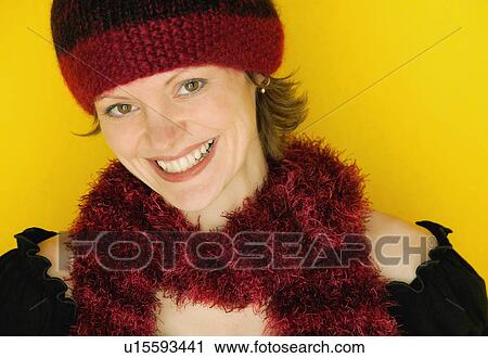 Woman modeling a winter hat and scarf View Large Photo Image Stock Image - Woman modeling a winter hat and scarf. Fotosearch