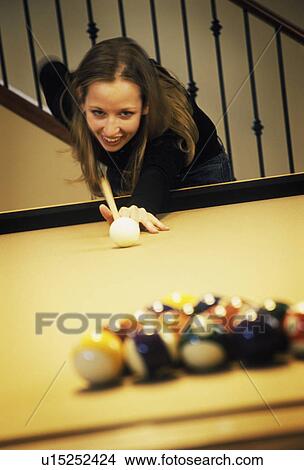 Woman playing pool View Large Photo Image Picture - Woman playing pool. Fotosearch