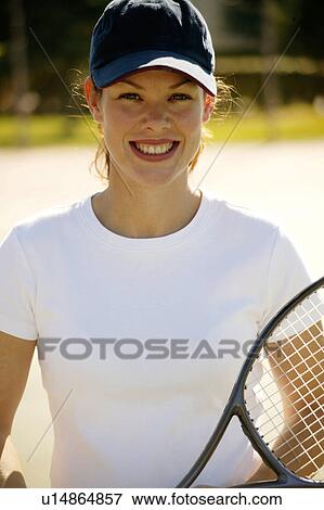 Woman playing tennis View Large Photo Image Stock Photo - Woman playing tennis. Fotosearch