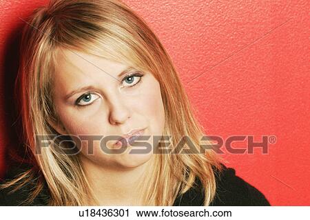 Stock Image - Woman pouts. Fotosearch