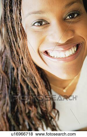 Woman smiles View Large Photo Image Stock Photo - Woman smiles. Fotosearch