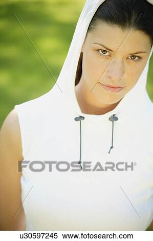 Woman wearing a hood View Large Photo Image Stock Photography - Woman wearing a hood. Fotosearch