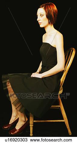 Woman wearing formal evening dress View Large Photo Image Stock Image - Woman wearing formal evening dress. Fotosearch