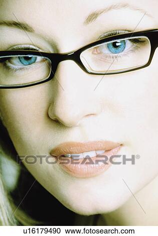 Woman wearing glasses View Large Photo Image Stock Image - Woman wearing glasses. Fotosearch