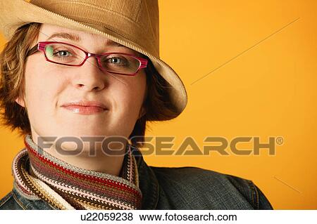 Stock Photo - Woman with a trendy hat. Fotosearch