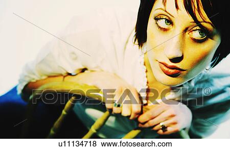 Stock Photo - Woman with big eyes. Fotosearch