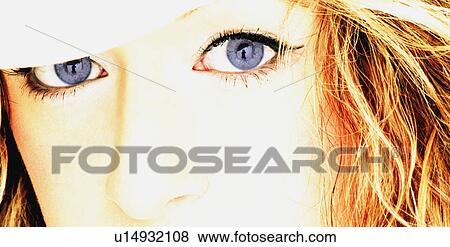Stock Photo - Woman with dark blue eyes. Fotosearch