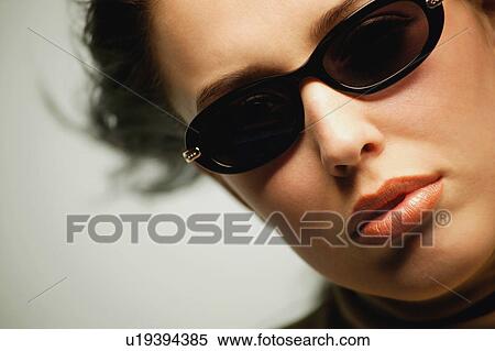 Stock Photography - Woman with sunglasses. Fotosearch