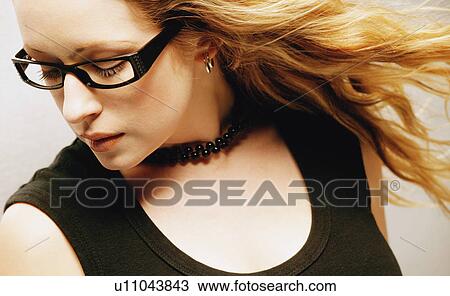 Stock Image - Woman with trendy glasses. Fotosearch