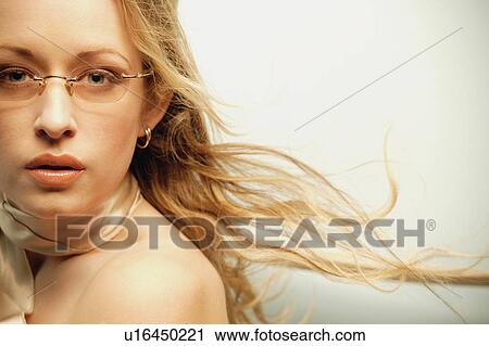 Stock Image - Woman with trendy glasses. Fotosearch