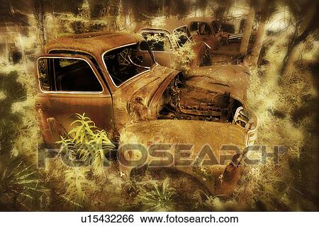 Wrecks of old trucks View Large Photo Image Stock Photograph - Wrecks of old trucks. Fotosearch