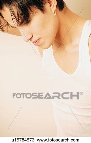 Young man thinking View Large Photo Image Stock Image - Young man thinking. Fotosearch