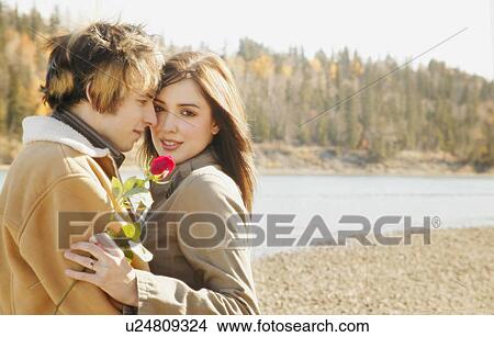 Picture - Couple embrace. Fotosearch