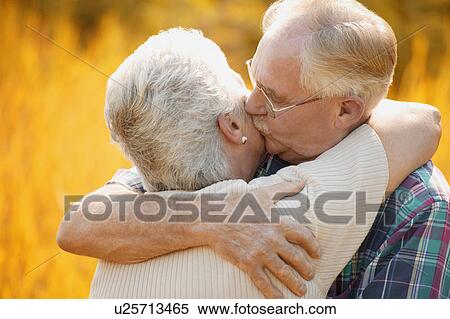 Couple kisses View Large Photo Image Stock Photography - Couple kisses. Fotosearch