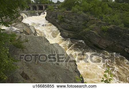 Fast flowing river View Large Photo Image Stock Photography - Fast flowing river. Fotosearch