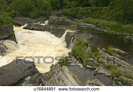 Stock Image - Strongly flowing river. Fotosearch