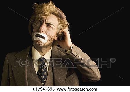 Stock Photography - An emotional clown. Fotosearch
