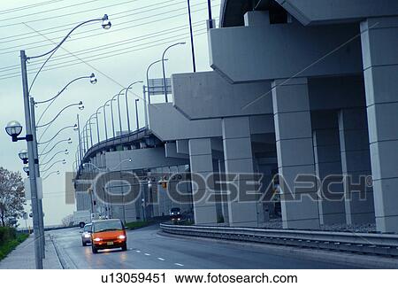 Stock Image - Driving in a city. Fotosearch