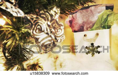 Stock Photo - Gifts under a tree. Fotosearch