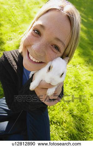 Girl with a pet View Large Photo Image Stock Image - Girl with a pet. Fotosearch