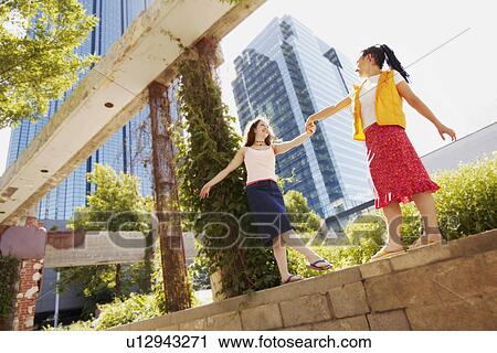 Stock Image - Two teenage girls. Fotosearch