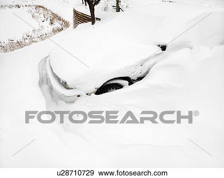 Stock Photo - Car buried in snow.. Fotosearch