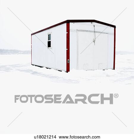 Picture - Fish house on frozen Lake Green in Minnesota.. Fotosearch