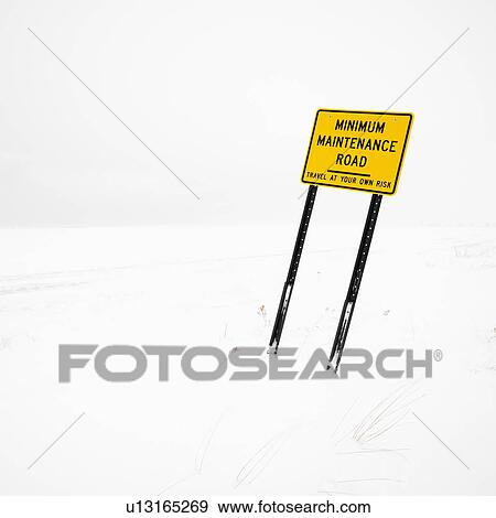 Minimum maintence road sign in deserted winter blizzard. View Large Photo Image Stock Photo - Minimum maintence road sign in deserted winter blizzard.. Fotosearch