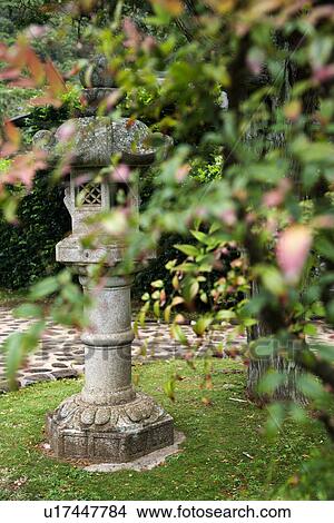 Shot of Asian garden statue in Iao Valley State Park in Maui, Hawaii. View Large Photo Image Picture - Shot of Asian garden statue in Iao Valley State Park in Maui, Hawaii.. Fotosearch