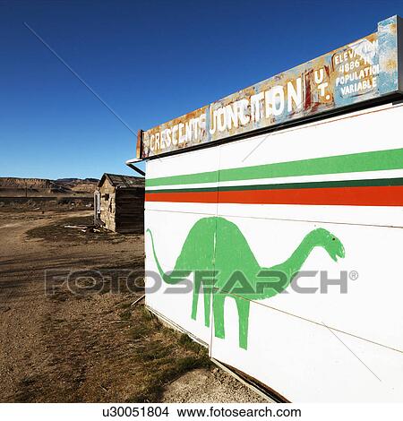 Picture - Small building iwht dinosaur painted on side in Crescent Junction, Utah. . Fotosearch