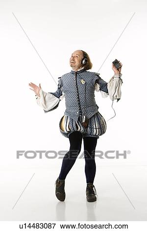 Stock Photo - William Shakespeare in period clothing listening to mp3 player and dancing.. Fotosearch