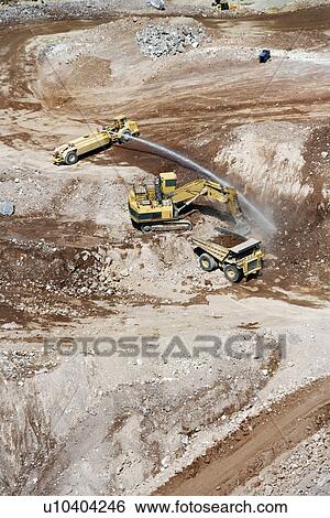 Stock Photograph - Aerial of heavy equipment vehicles in suburban land development area of Las Vegas, Nevada, USA.. Fotosearch